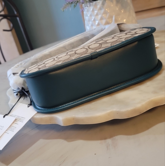 Coach Swinger in signature jacquard with teal color. - Picture 10 of 12